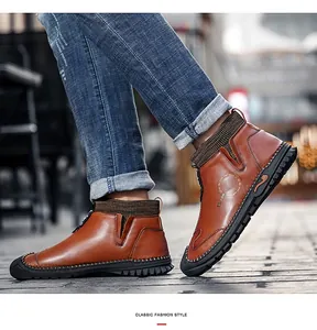 Side view of men's casual brown leather loafers with handmade stitching details