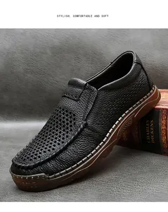 Detailed view of men's perforated breathable black leather loafers for summer