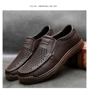 Detailed macro shot of brown breathable hollow leather slip-on loafers for men