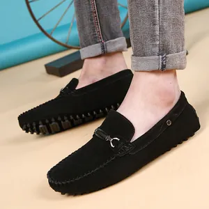 Comfortable men's black suede loafers featuring a metal buckle and flexible soft rubber sole