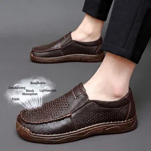 Breathable brown leather loafers for men featuring perforated design and slip-on style