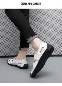 Detail view of breathable white summer sandals for men with soft black soles