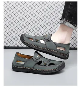 Detailed side view of men's breathable leather beach sandals with decorative stitching