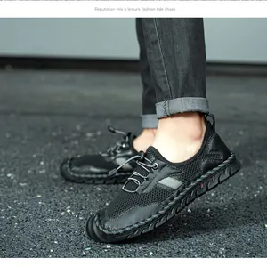 Vue détaillée des chaussures de randonnée en maille noire respirante pour hommes avec lacets