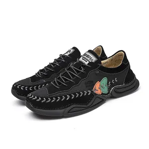 Men's black fashion sneakers with colorful patches and chunky octopus style sole