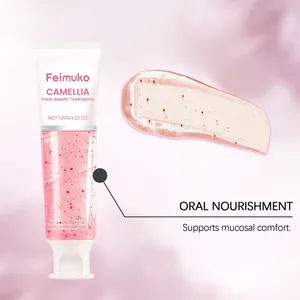Vue détaillée de la texture du gel dentifrice camélia rose aux particules rouges