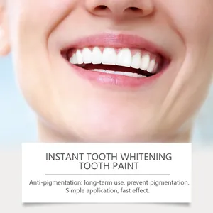 Detailed close-up of tooth whitening paint effect showing a healthy bright white smile