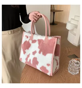 Stilvolle Kunstfell-Tragetasche mit Kuhmuster in Rosa und Weiß für Damen, groß