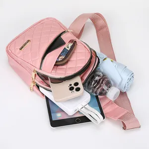 Stylish pink quilted sling bag with large capacity for daily essentials and tablets