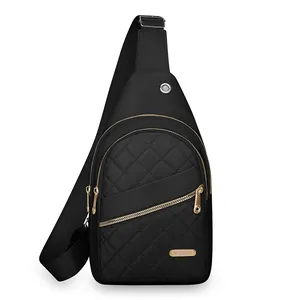 Stylish black quilted chest bag for women with gold zippers and adjustable crossbody strap