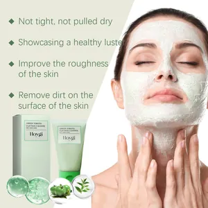 Woman applying green tomato clay pack cleanser with plant ingredient highlights