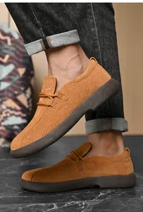 Stylish men's tan suede low-top outdoor casual loafers with decorative cord detailing