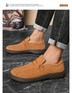 Detailed side view of brown suede-textured men's casual shoes with durable rubber soles