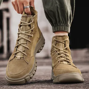 Durable khaki high-top tactical hiking boots for men in an outdoor desert setting