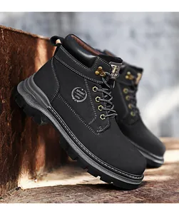 Close-up of black leather Martin boots with durable lug sole and metal eyelets