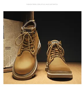 Close-up of tan nubuck Martin boots with durable laces and thick soles.