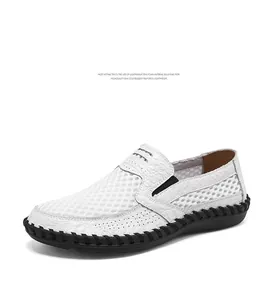 Side view of white breathable mesh casual loafers for men with black stitched sole