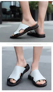 Side and front view of men's casual white slip-on sandals with metal stud details