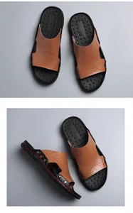 Detailed view of men's casual sandals with brown crocodile pattern and rivet accents.