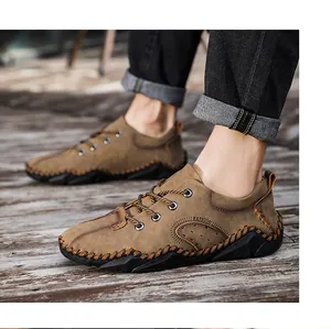 Close-up view of men's brown lace-up leather casual shoes with hand-stitched details