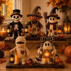 Detailed view of Halloween monster figurines with glowing lanterns for table decor