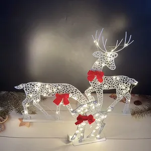Beautiful set of 3 glowing white iron Christmas reindeer with red bows and LED lights