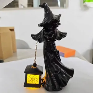 Handgemaakte zwarte hars heks figuur met gloeiende LED spinnenweb lantaarn voor Halloween