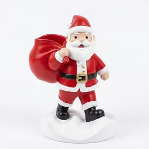 Figurine de Père Noël en résine détaillée utilisée comme pot de rangement de bureau