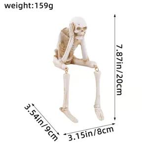 Figurine de squelette d'Halloween assise avec dimensions et poids affichés
