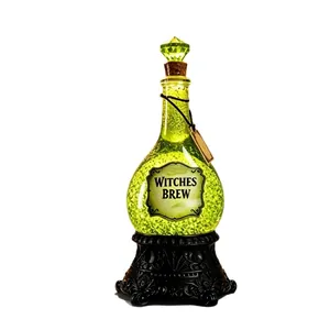 Glow-in-the-dark Halloween resin potion bottle 'Witches Brew' with ornate black base