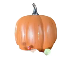 Elegant orange glass pumpkin decoration with silver stem for Halloween home decor.