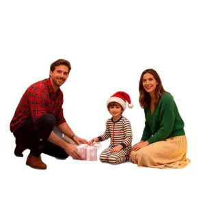 Happy family opening a Christmas gift box, lifestyle scene for Gingerbread Golf Game Set