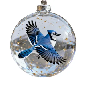 Elegant Nature's Birds crystal glass ornament featuring a flying Blue Jay bird and stars