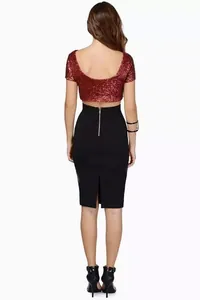 Back view of a shimmering wine-red sequin crop top with an elegant open back design.