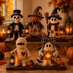 Decorative Halloween monster figurines with lanterns for indoor festive atmosphere