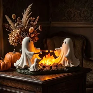 Detailed macro view of a cozy resin Halloween ghost night light with a warm campfire glow