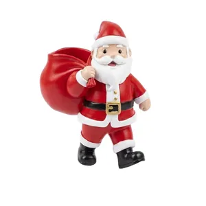 Figurine de Père Noël en résine servant de pot de fleurs et de rangement décoratif