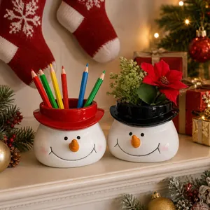 Festive snowman ceramic pencil holder and planter set for Christmas home decor and storage