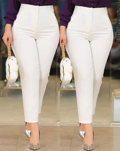 Professional detail shot of white slim-fit high-waisted cropped suit trousers for women.