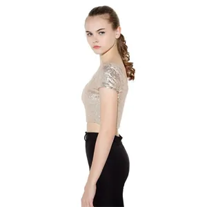 Side view of a sparkling champagne gold sequin crop top with short sleeves for party
