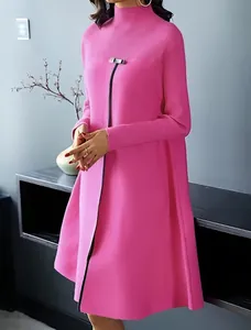 Detailed view of an elegant pink high-neck long-sleeve dress with a large swing skirt.