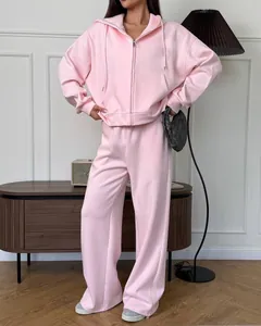 Comfortabele roze oversized hoodie met rits en joggingbroek met wijde pijpen set.