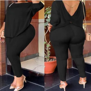 Back and side view of a black seamless 2-piece high-stretch yoga set for women.