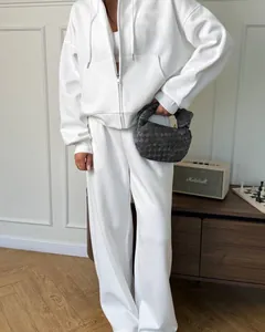 Oversized witte hoodie met rits en broek met wijde pijpen, tweedelige set voor dames