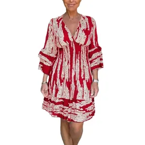 Boho style women's V-neck printed dress with flared sleeves and smocked waist
