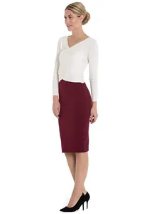Professional model wearing a high-waisted burgundy pencil skirt and white knit top