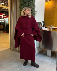 Detailed look at burgundy three-piece knit sweater set with matching large scarf