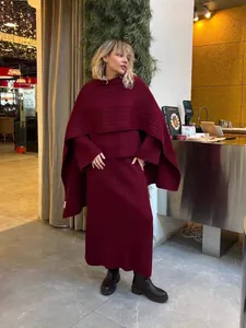 Elegant burgundy three-piece knit set with sweater, wide-leg pants, and oversized scarf