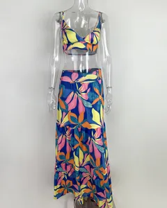 Two-piece floral print set featuring a V-neck camisole top and a tiered maxi skirt