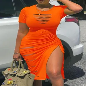 Close-up view of sexy orange bodycon dress with hollow-out chest and drawstring slit detail